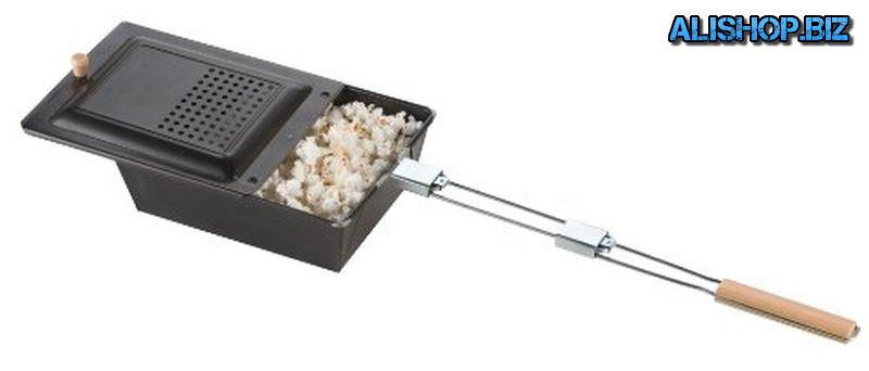 Griddle to cook popcorn on an open fire from Coleman